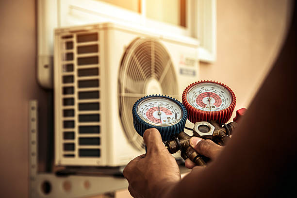 Professional Air Conditioning Service technician working in Crest Hill, IL